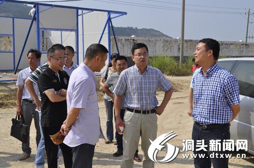 张京赴大门召开拆违美化现场会